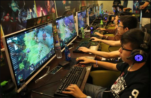 New Straits Times Malaysian gamers battling it out in a 'Dota 2' tournament.